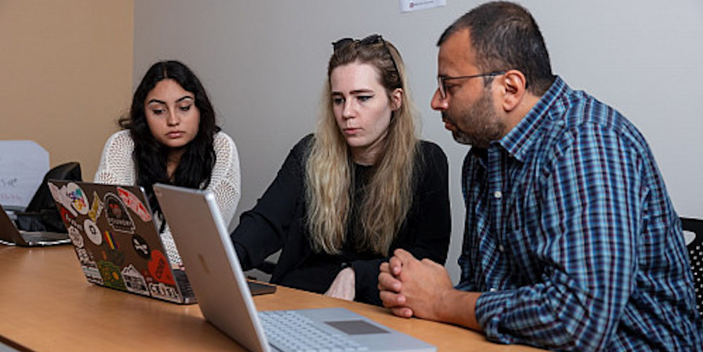 Evelyn Avalos, AJ Knoors and Sunandan Chakraborty are part of the team working to develop an AI chatbot that will assist K-12 teachers with making their STEM lesson plans more inclusive of all students. Photo by Liz Kaye, Indiana University.