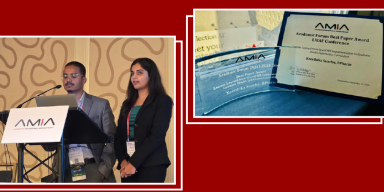 Chandra Vikram and Keerthika Sunchu stand at podium at AMIA Symposium; Keerthika Sunchu Best Paper Award