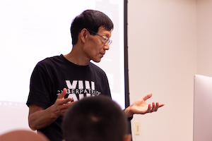 Computer Science professor Xukai Zou speaking to Cybercamp participants