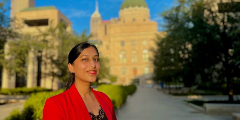 Palak Rajauria in front of the statehouse