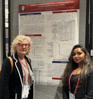 Health Informatics alumna Sadia Afreen with poster at AMIA